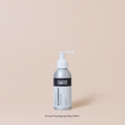 Bottle of Moxie Featherweight Conditioner on a beige background