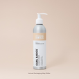 Bottle of Curl Basics Conditioner on a beige background