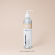 Bottle of Curl Basics Shampoo with pump on a beige background