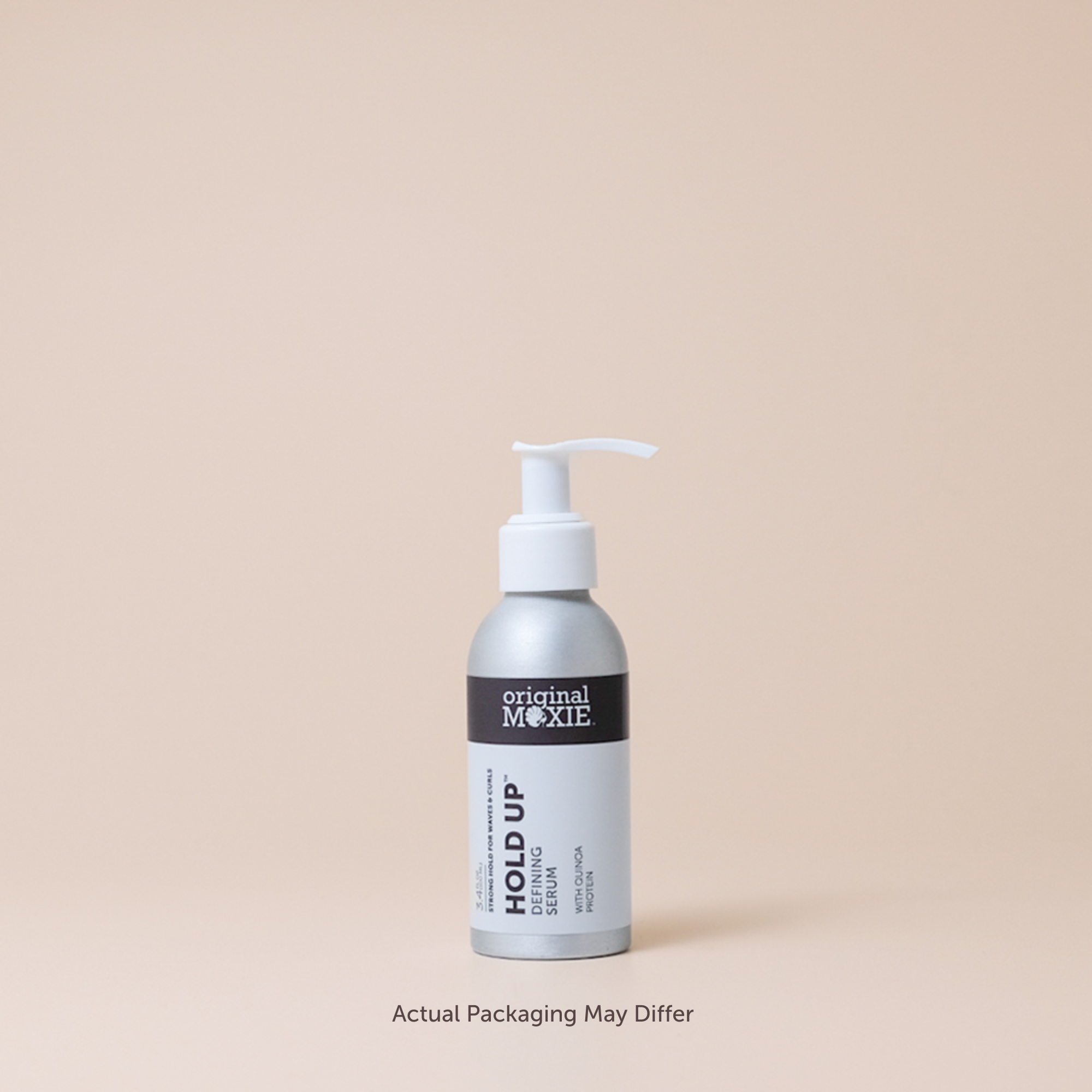 Bottle of &#39;Hold Up&#39; serum by Original Moxie on a beige background