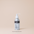 Bottle of 'Hold Up' serum by Original Moxie on a beige background